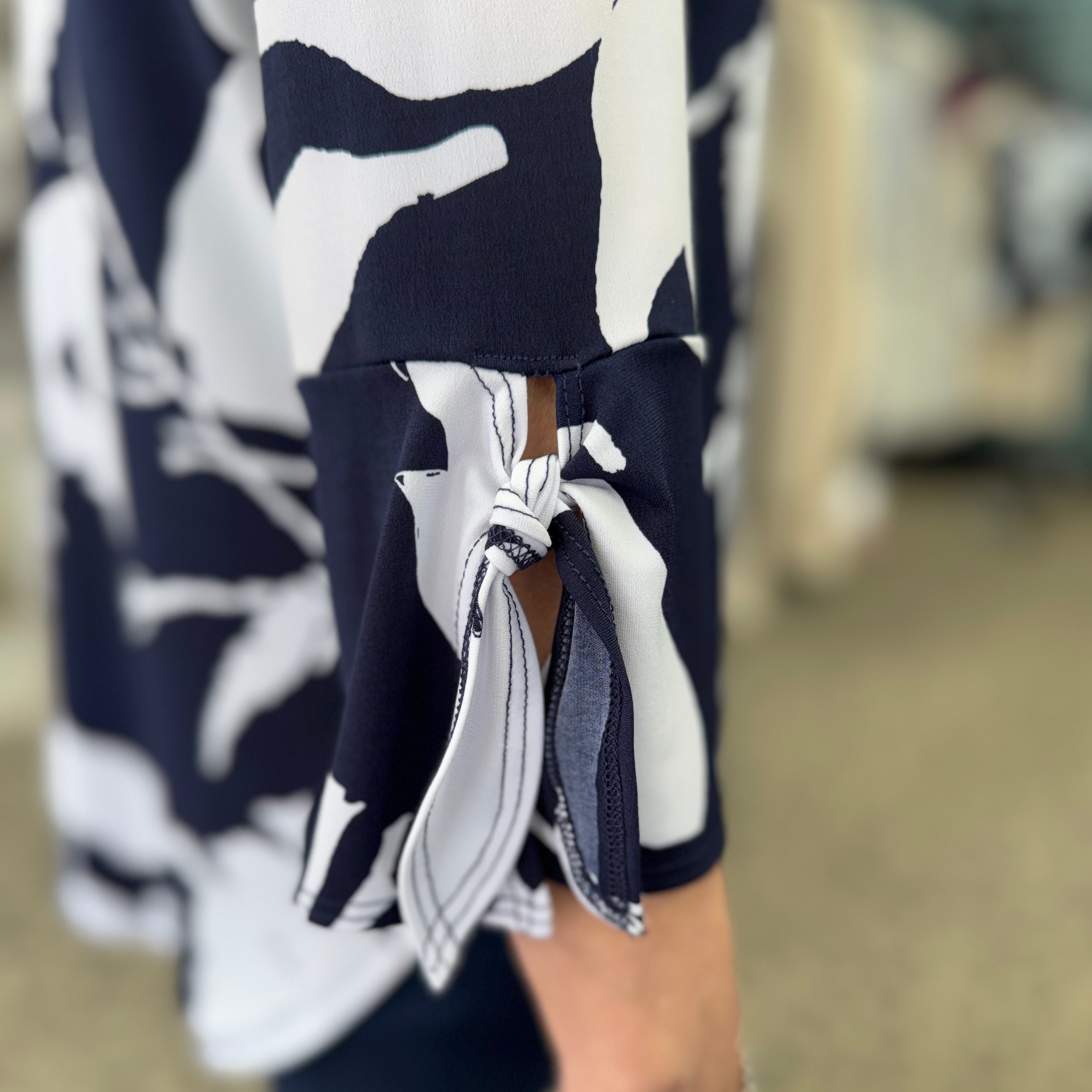 Tie Cuff Curved Hem Tunic