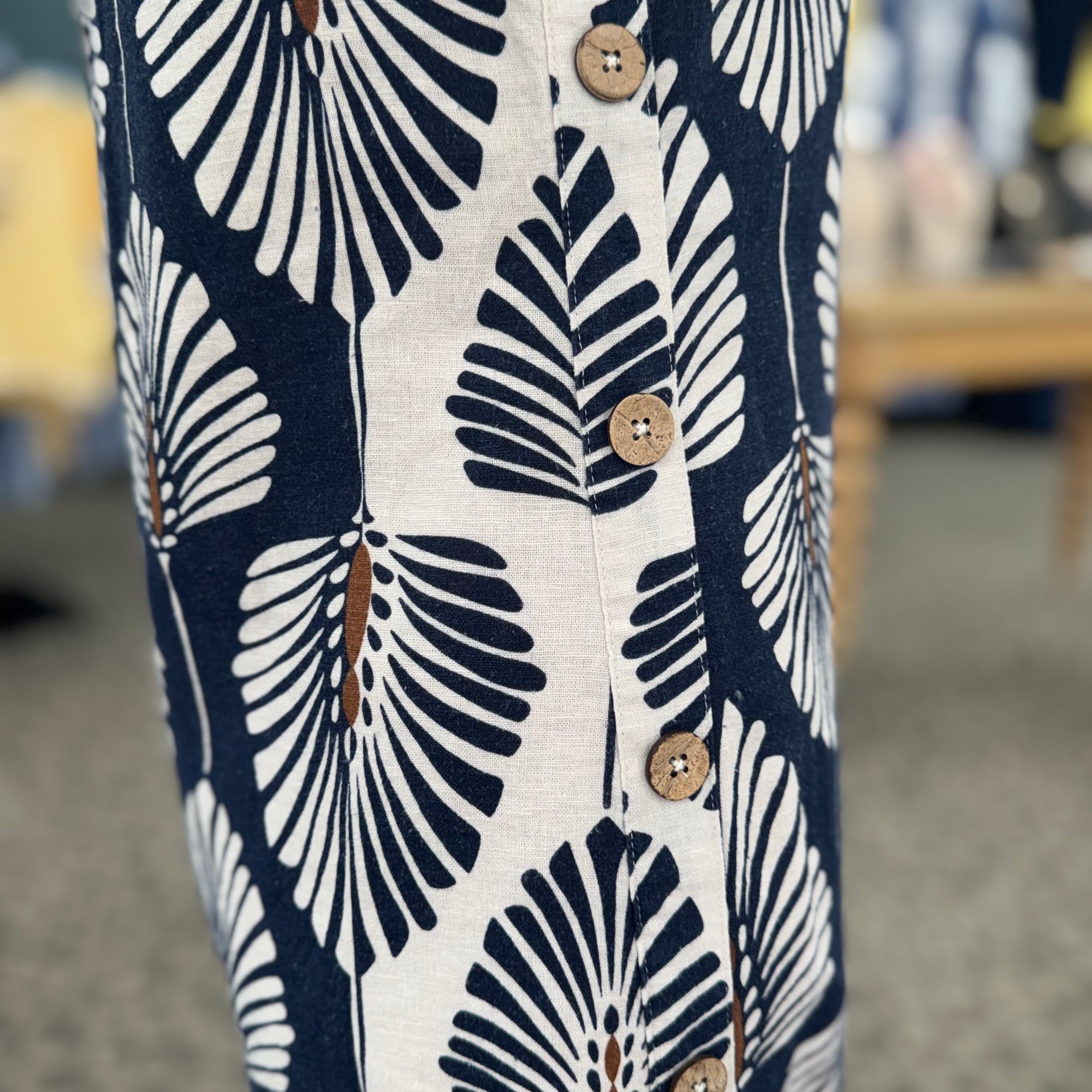 Printed Sleeveless Shift Dress with Decorative Side Button