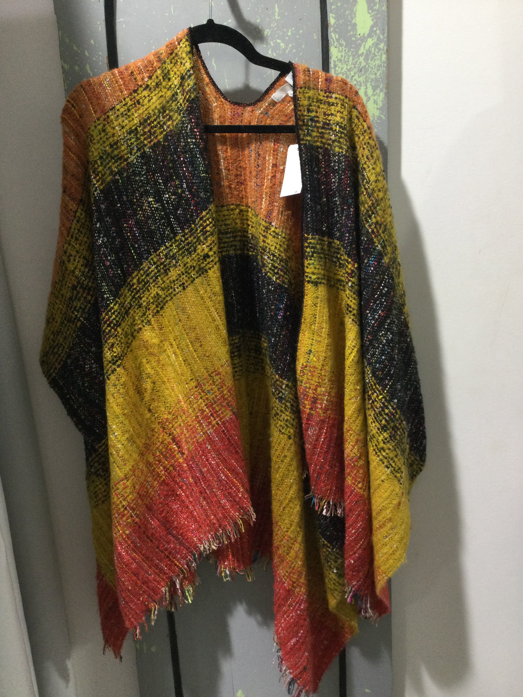 Wrap poncho in assorted colors
